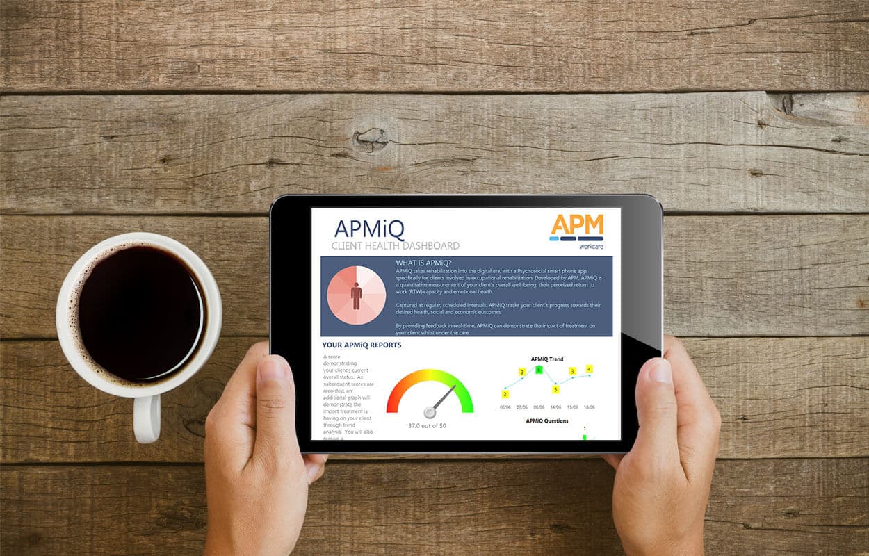 Tablet device with APMiQ dashboard displayed, showing data insights