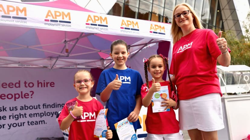 A woman with young children in APM tshirts celebrate the WA fundraising event Telethon