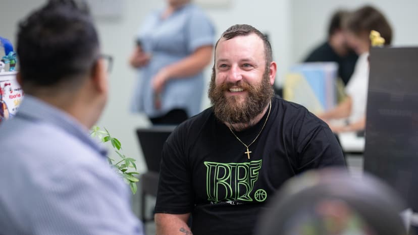 A Workforce Australia participant sits with an APM consultant as part of the SWAG event in Bendigo