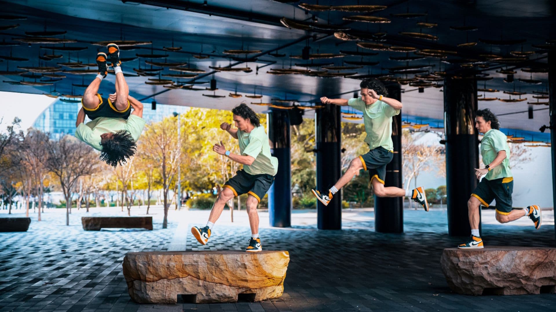 A young man is shown making a series of jumps and flips in an enhanced photo 