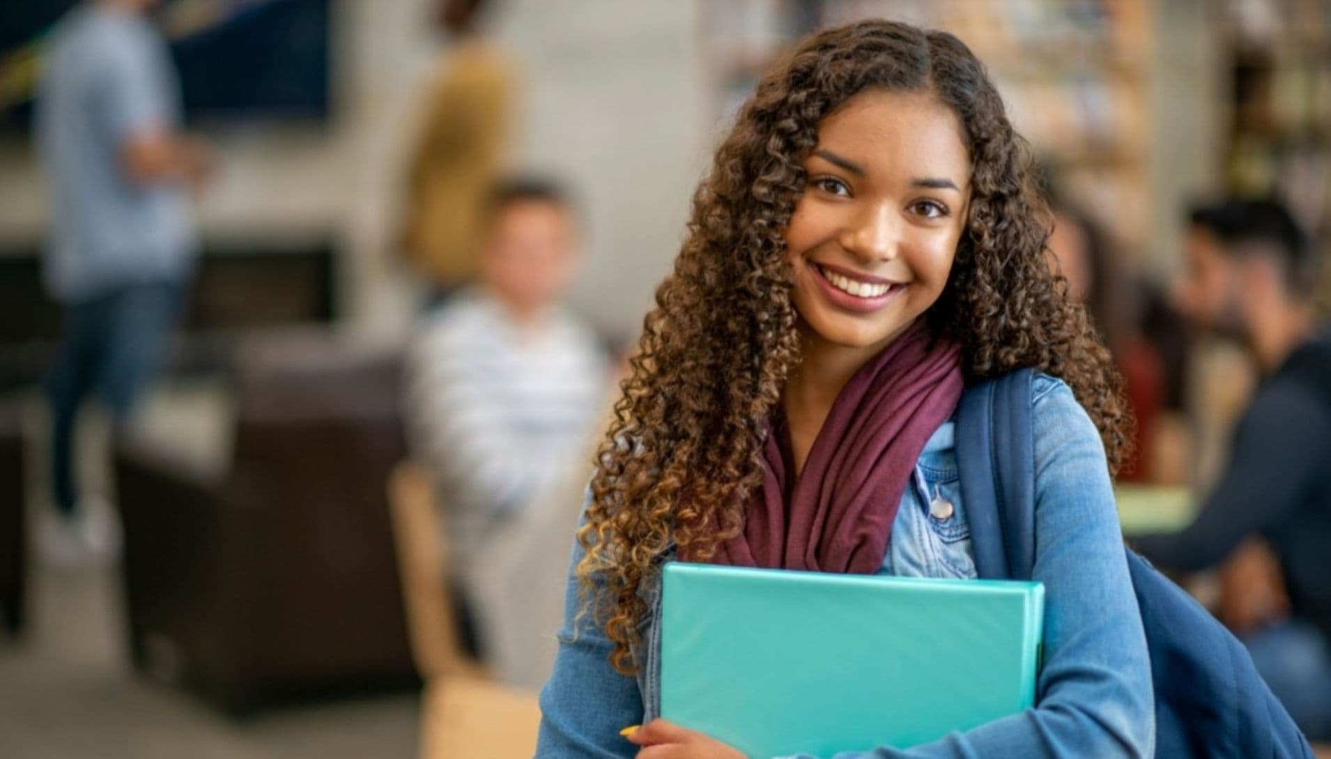 Female student holding books