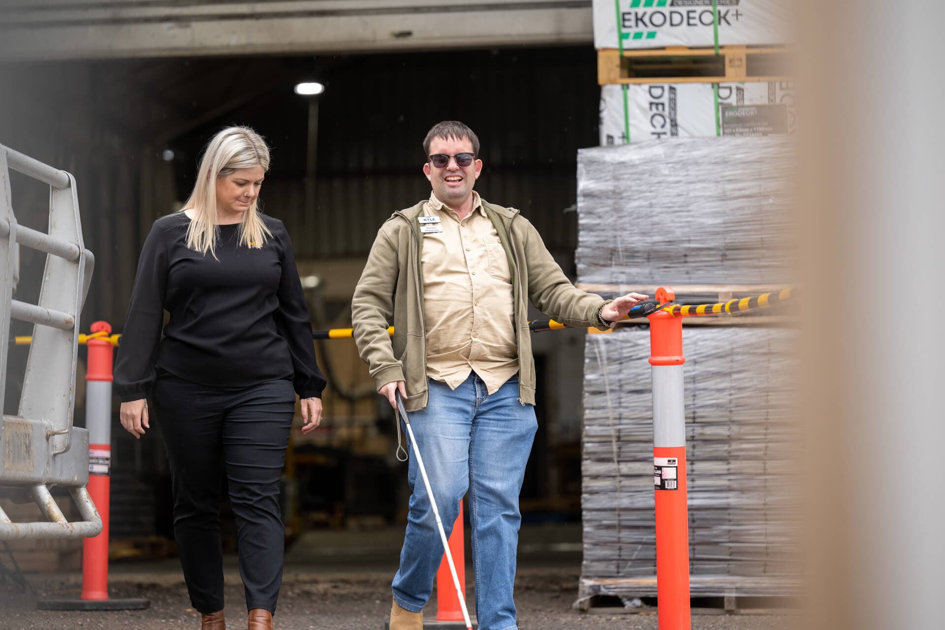 blind man walking with a woman