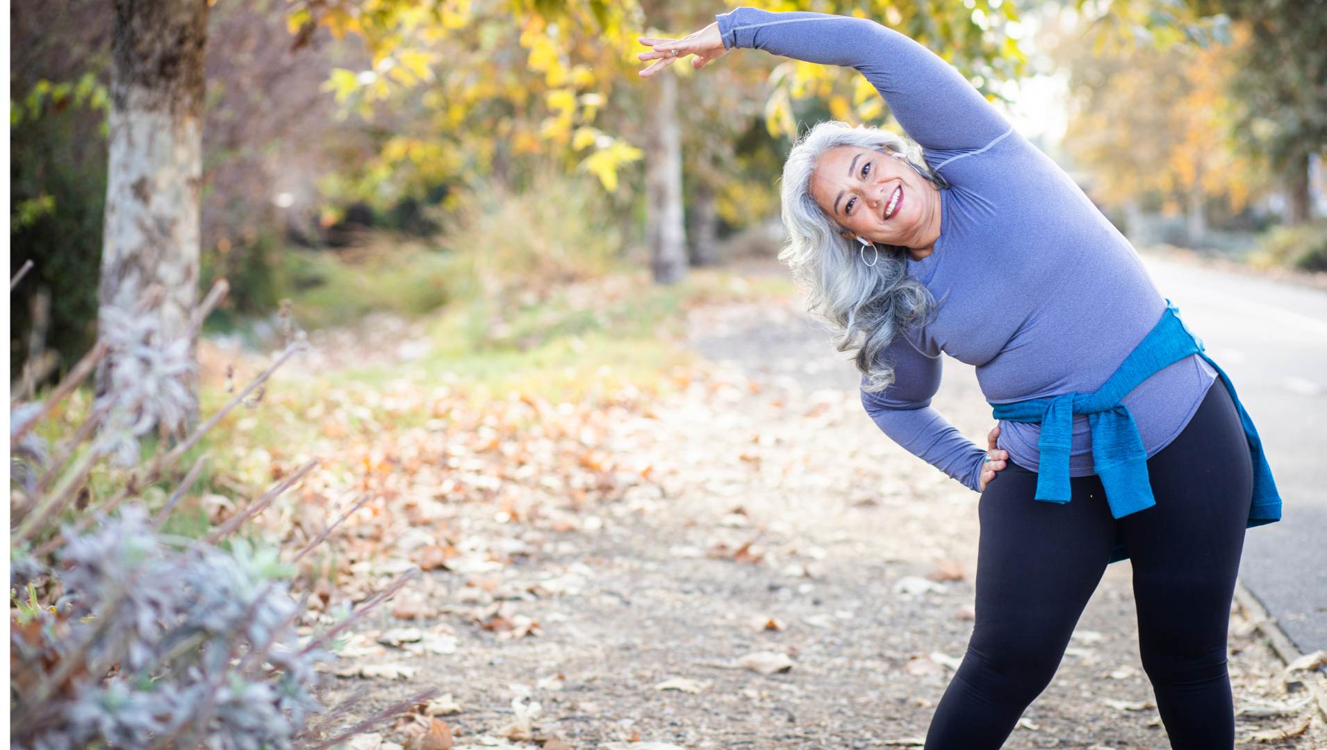 Woman stretching in fitness gear to support back health