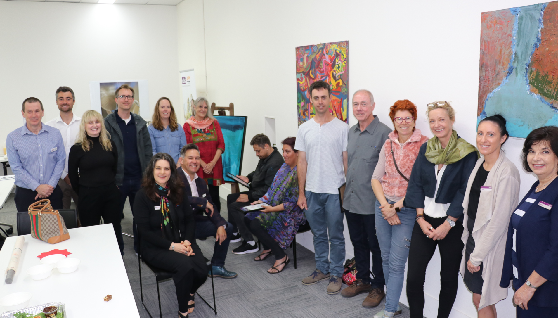 Attendees at the art launch event at APM Fremantle office