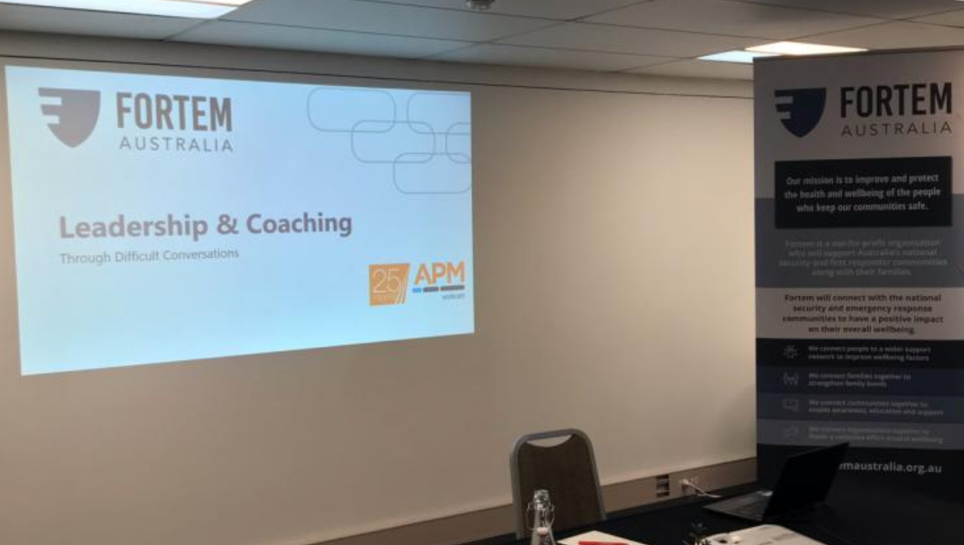 Photo of the opening slide from the Fortem and APM WorkCare training session