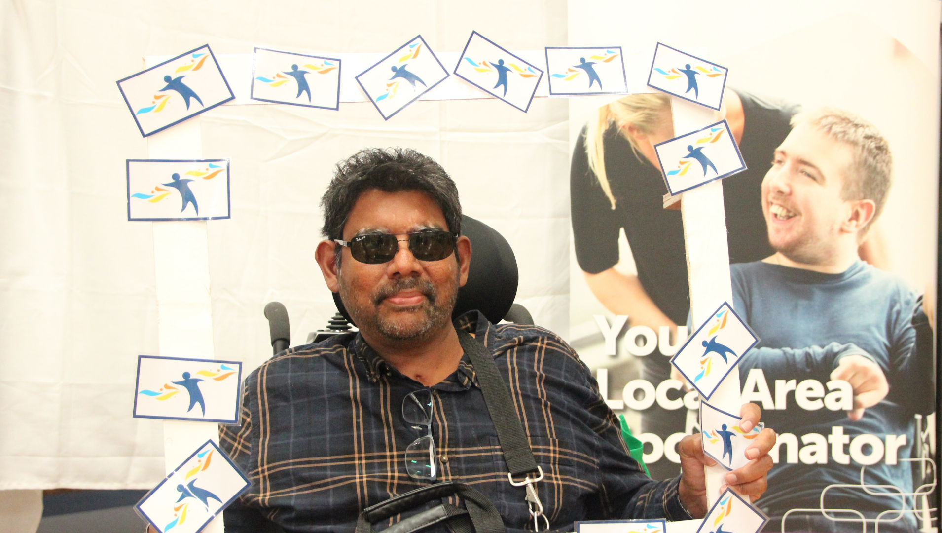 A male attendee at the APM Communities event for international day of people with disability