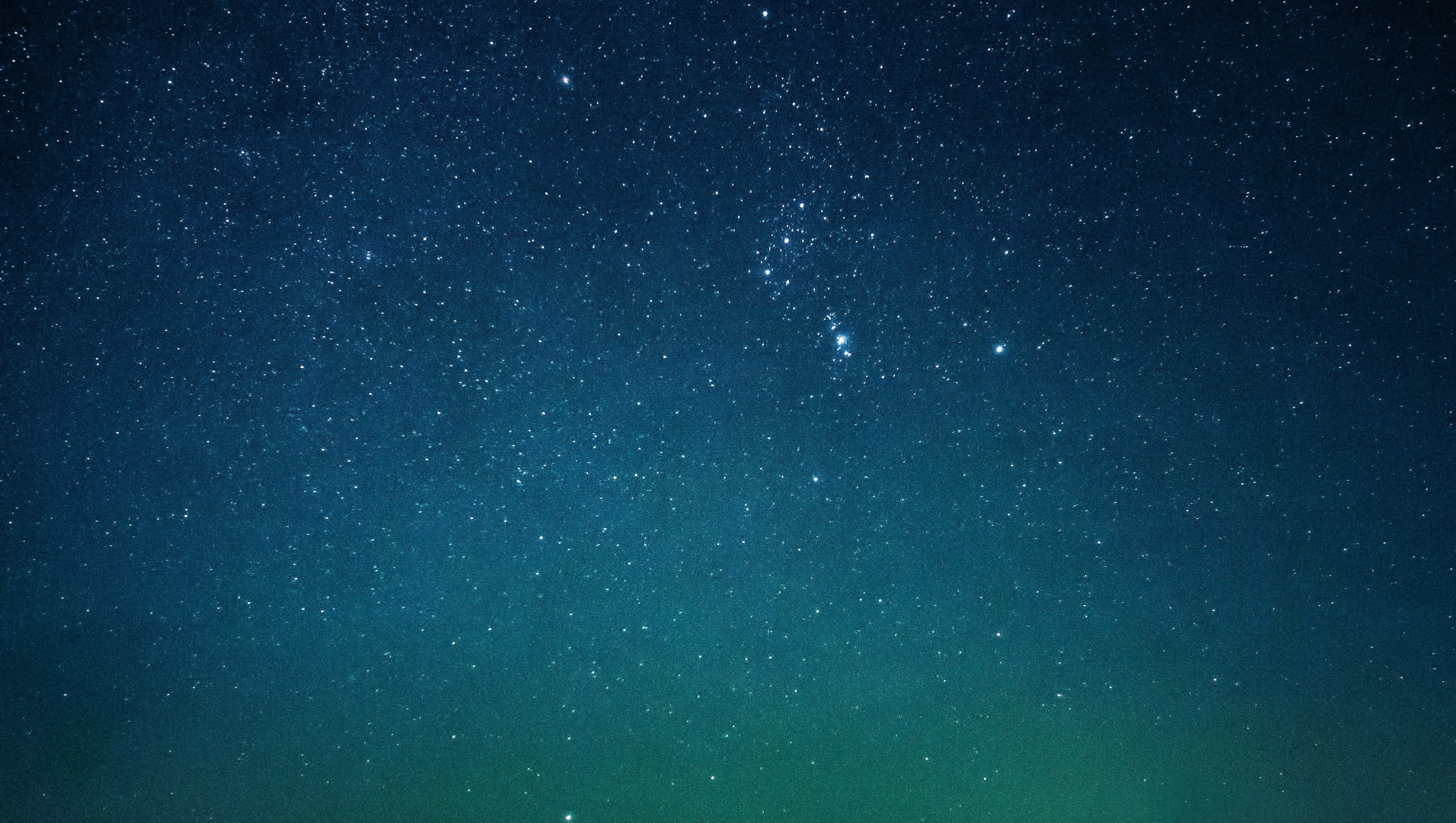 A wide angle shot of a starry night sky