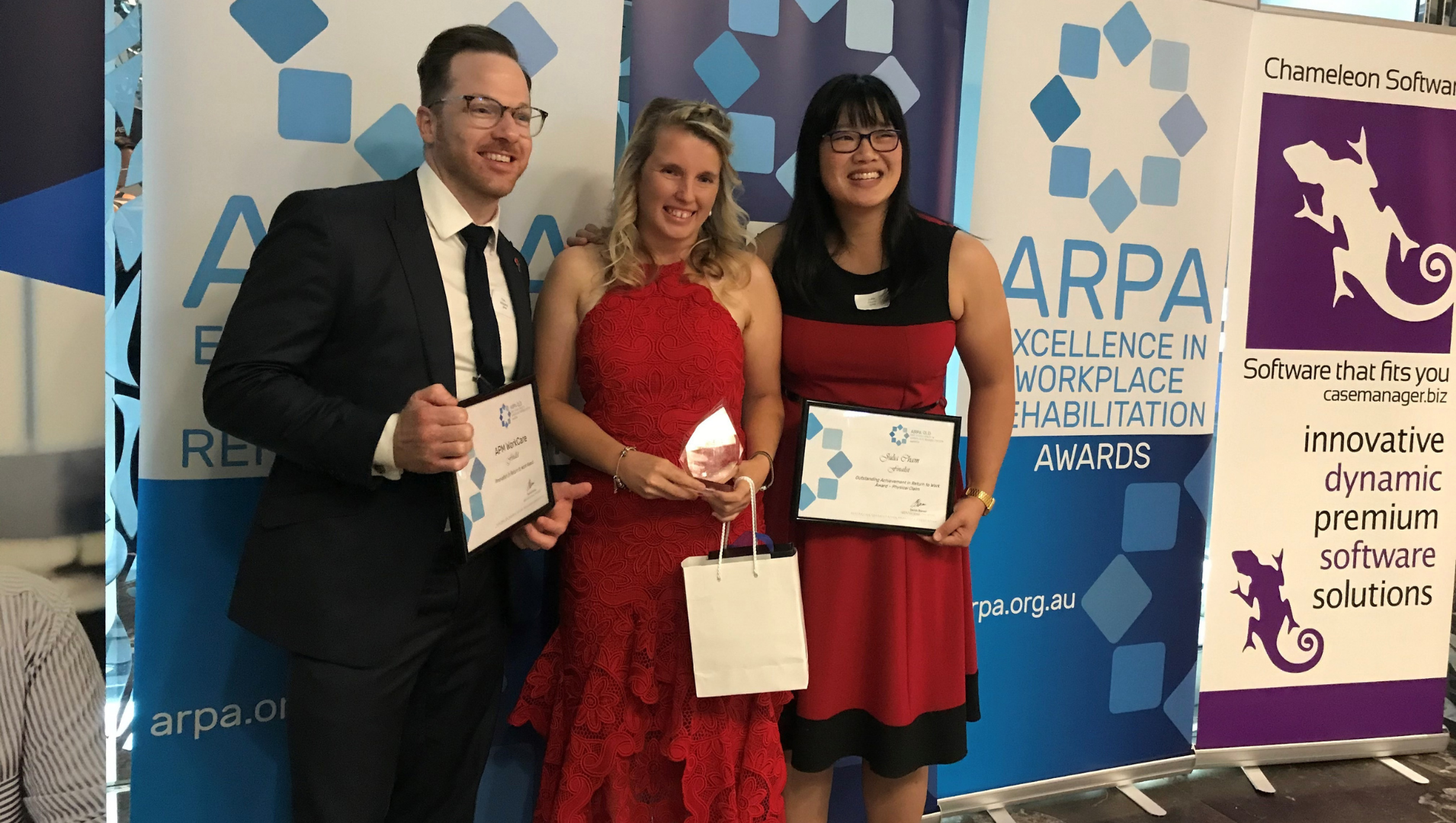 Ashlyn Dyer and her APM WorkCare Colleagues Julia Cham and Tim Williams at the ARPA awards ceremony