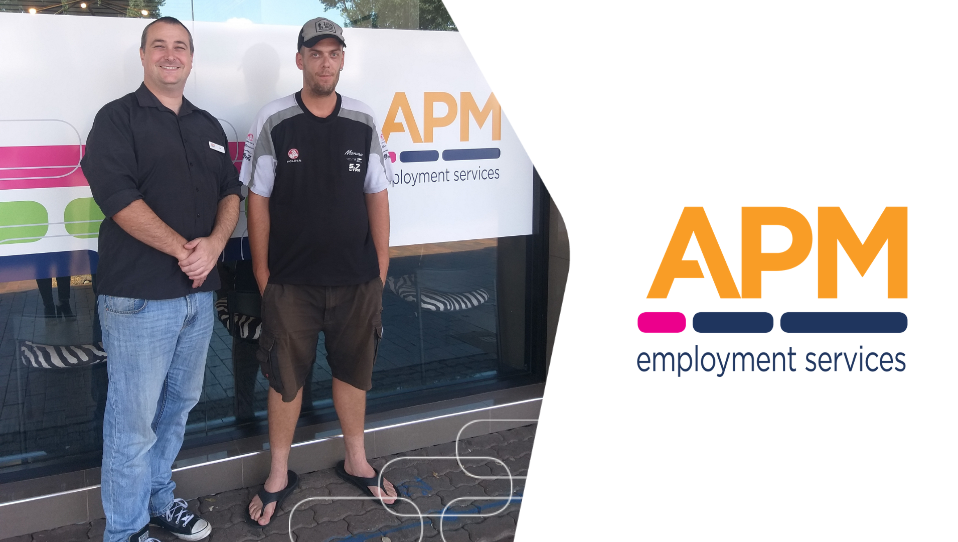 Joel and Tod are pictured together, smiling in front of the APM Dubbo office