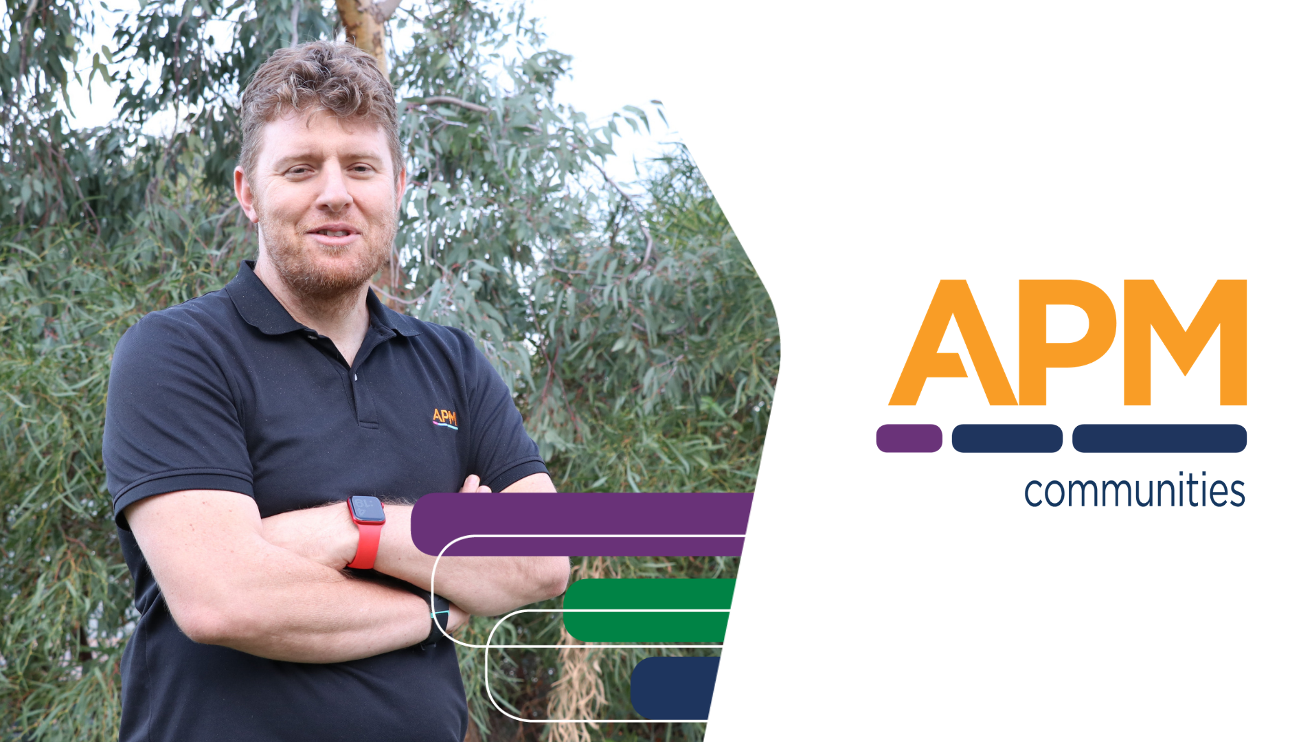 Ben is pictured standing straight with his arms folded, pictured next to the APM Communities logo