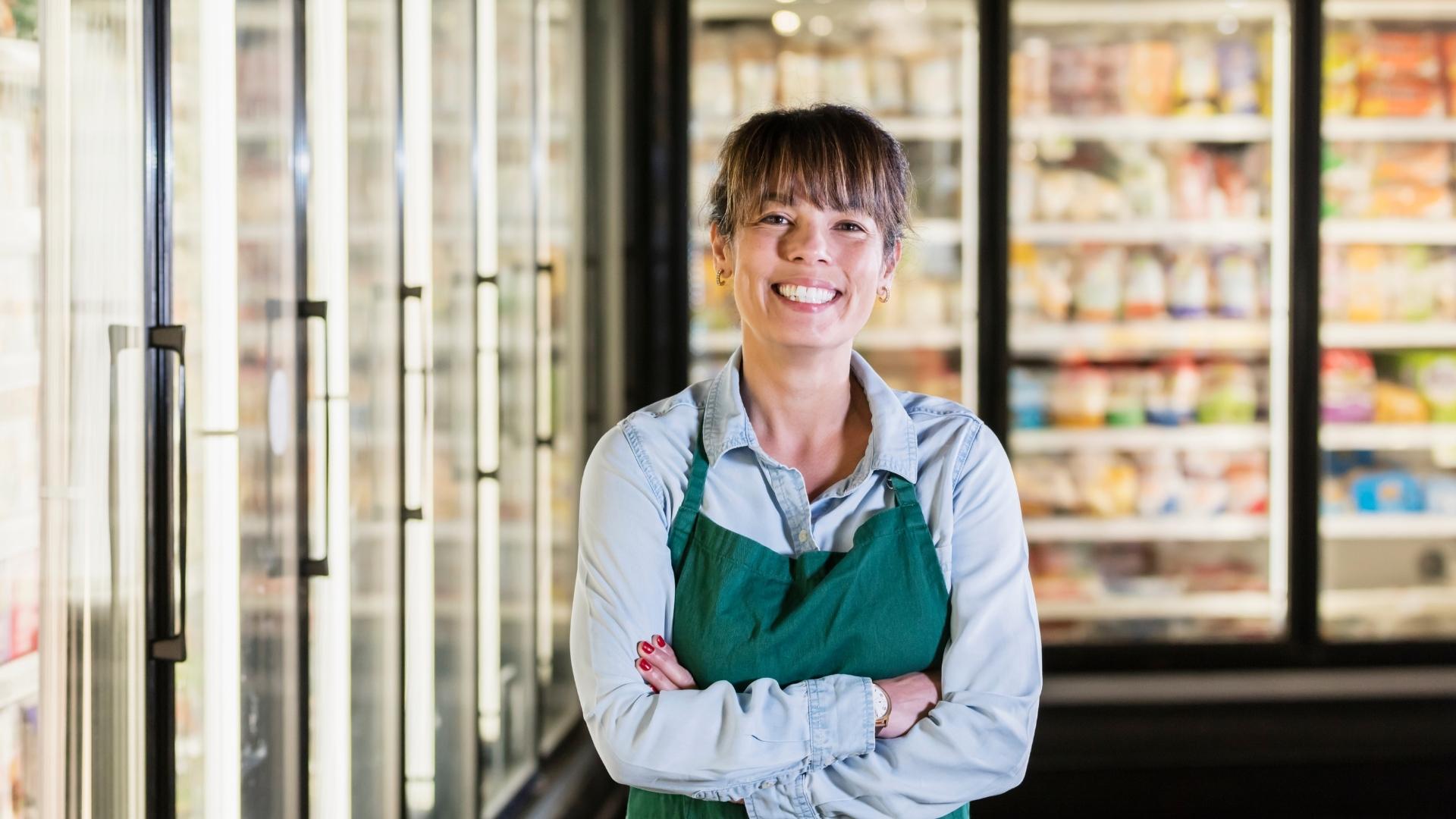 Woman smiling in a supermarket