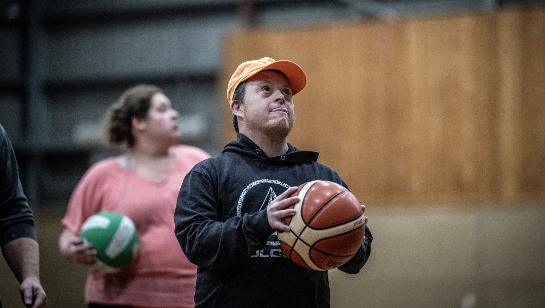 Basketball player prepares to shoot in the all abilities side