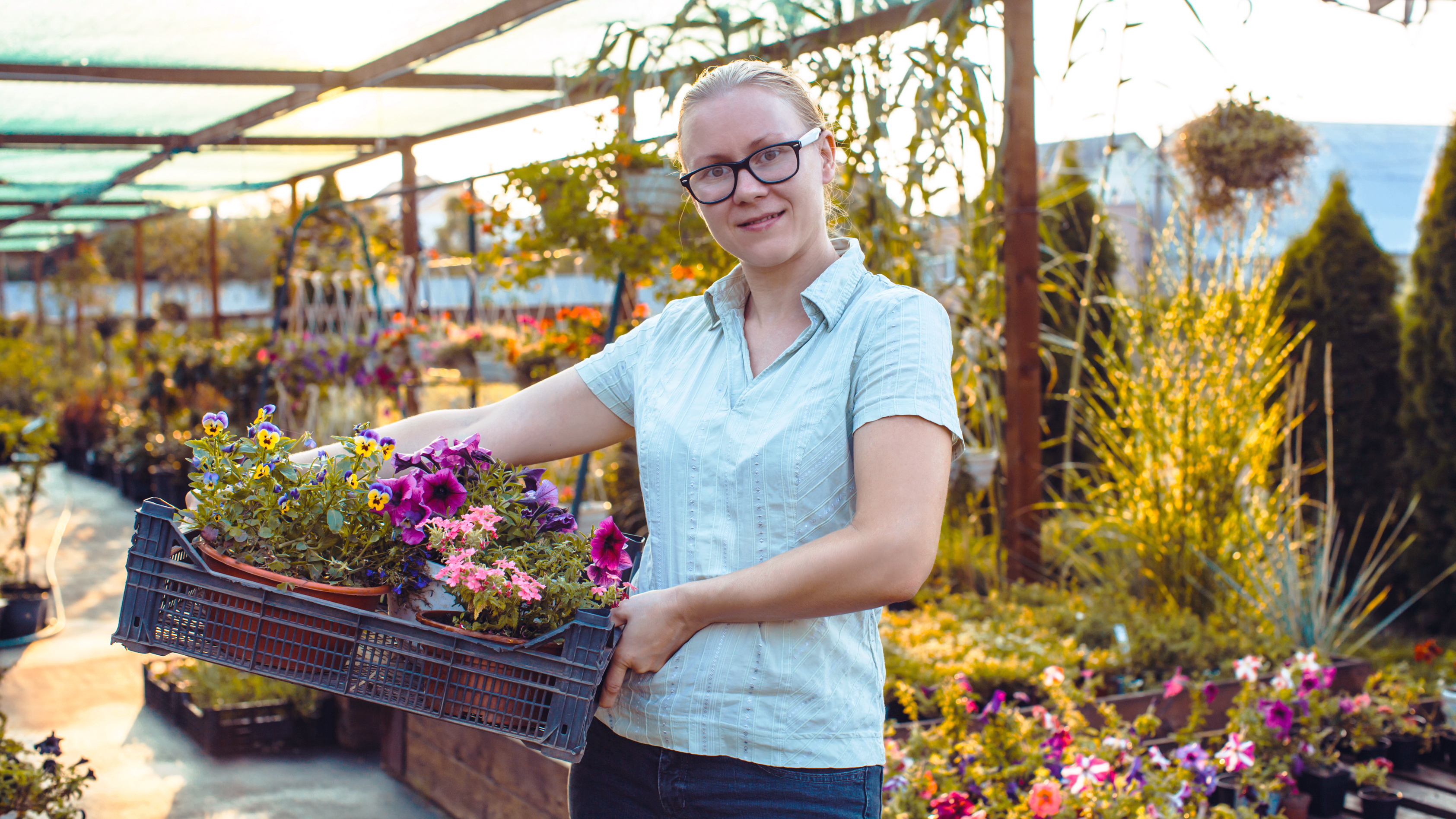 Woman with a disability working in a garden centre