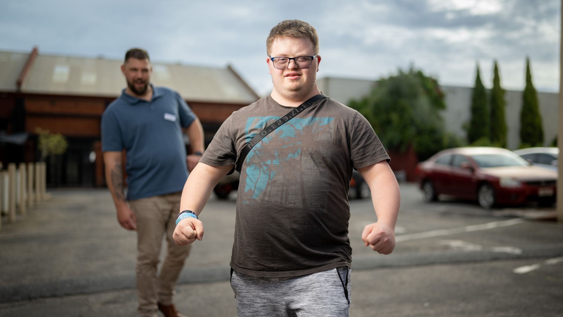 Jack walking outdoors as he works towards future employment and personal goals with support.