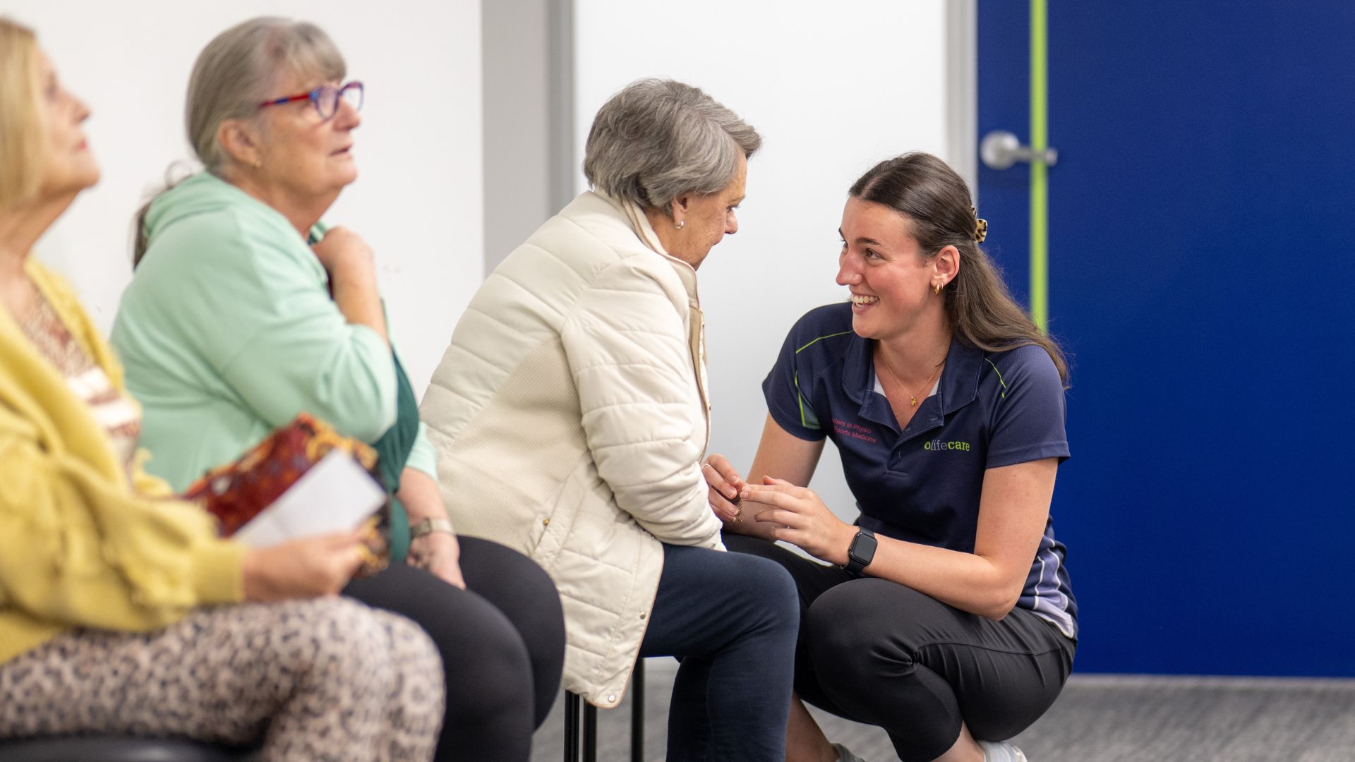 A Lifecare Croydon clinician provides guidance and reassurance to clients ahead of a pilates session in the clinic.