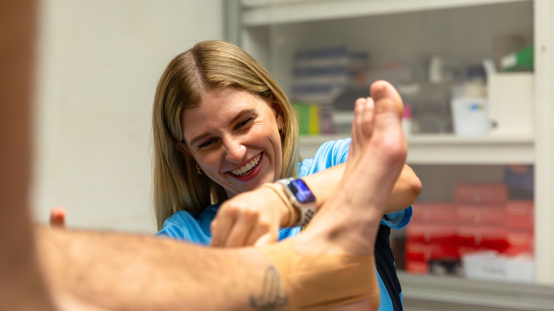 Annie carries out a physiotherapy assessment as part of her work with athletes. The image demonstrates hands-on treatment, injury assessment and sports rehabilitation delivered through Lifecare's physiotherapy services.