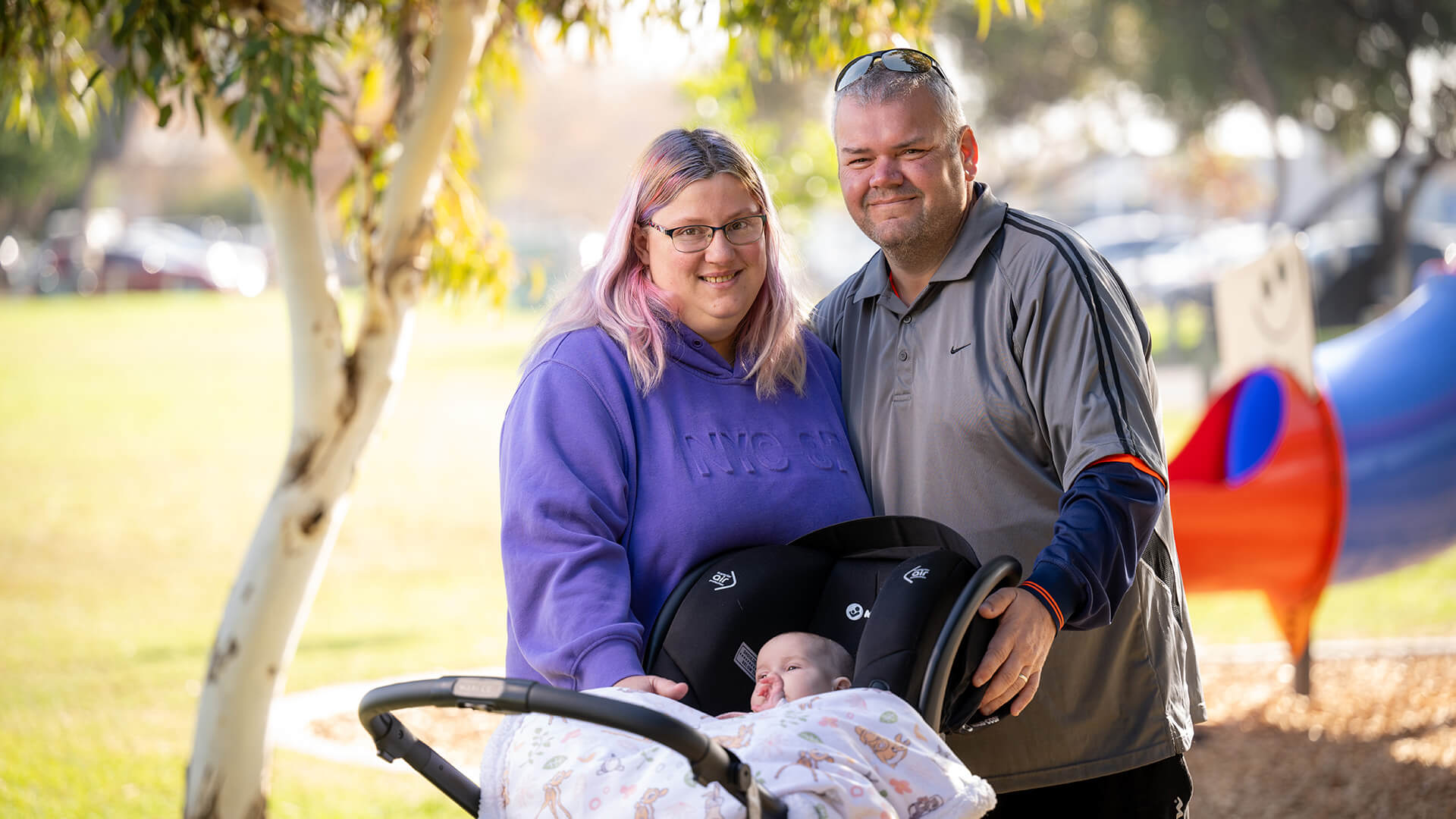 GEoff smiles with his family