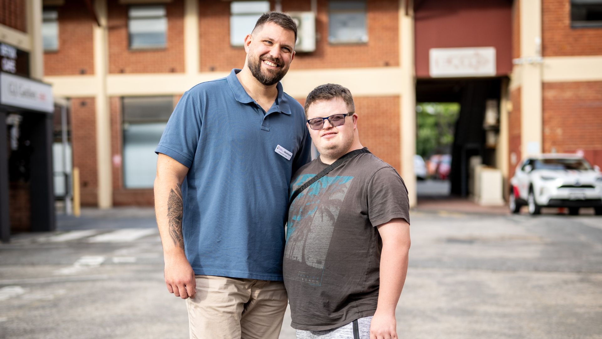 Jack and an Everyday Independence employment coach standing together during his employment support journey.