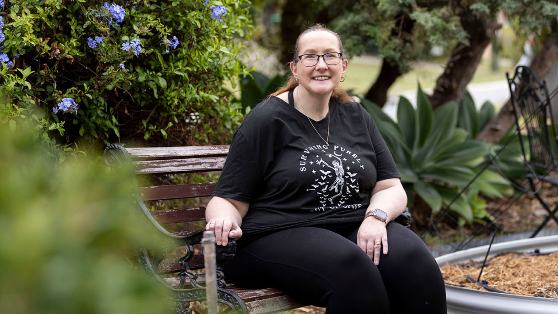 Jodie sits outdoors at home as part of her ongoing journey with Lifecare Homecare. The image supports a story about long-term home-based physiotherapy, personalised allied health support and maintaining independence through consistent care.