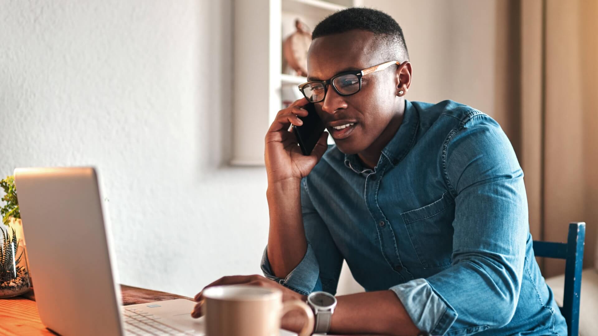 A man talking on the phone about a job prospect