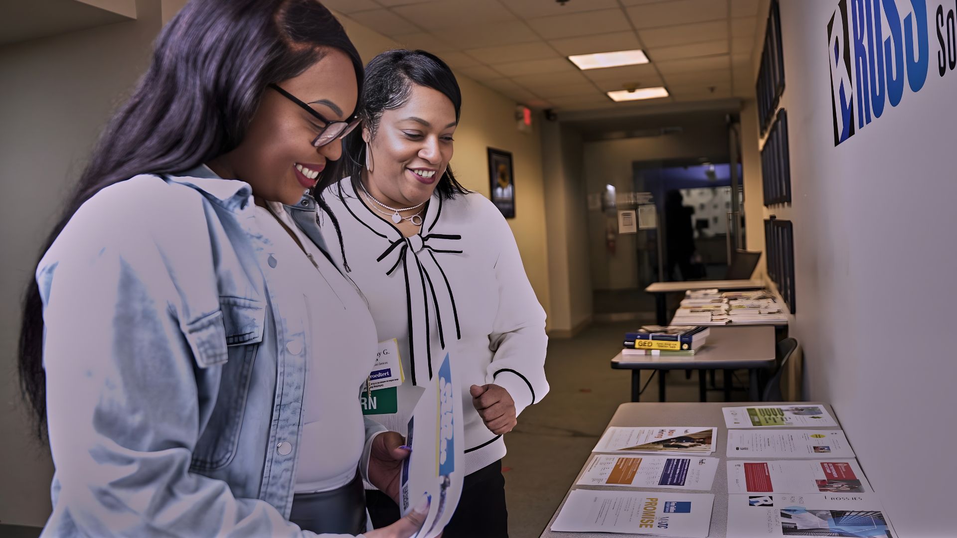 Destiny and her mentor review nursing materials, reinforcing skills and motivation for success.