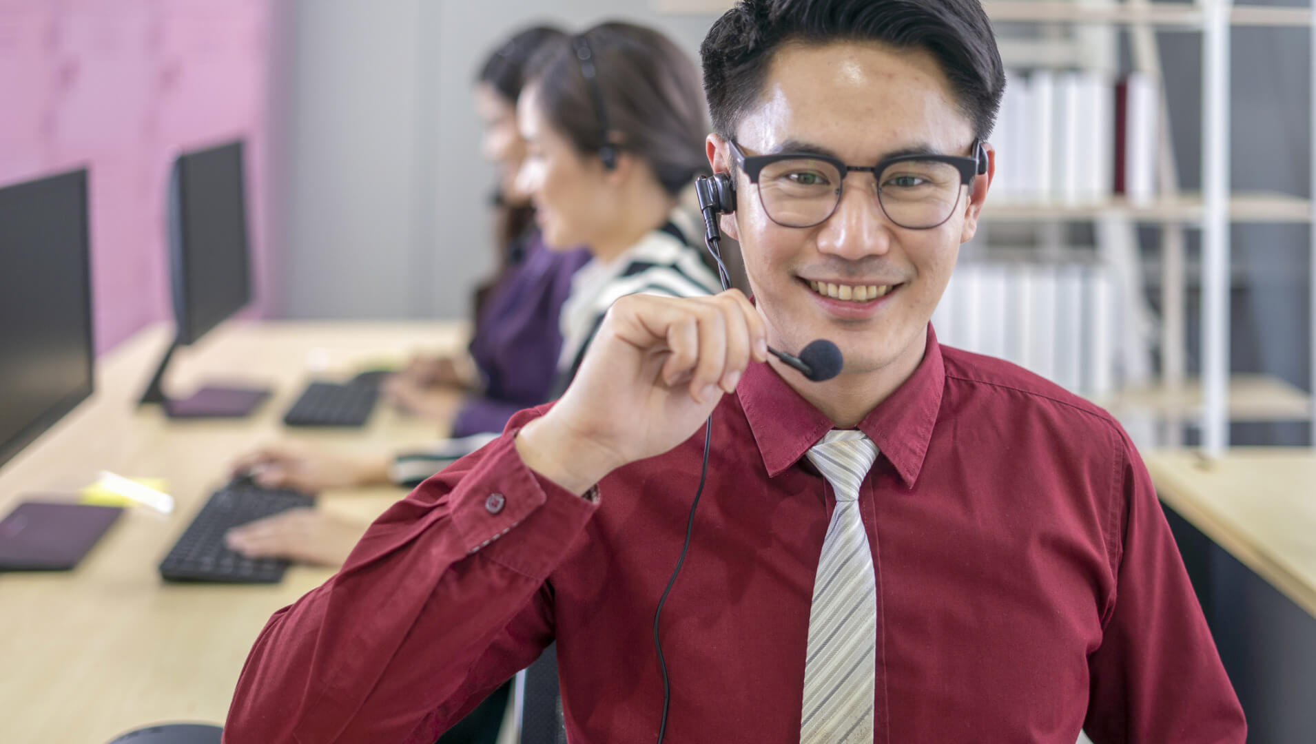 A smiling call centre worker