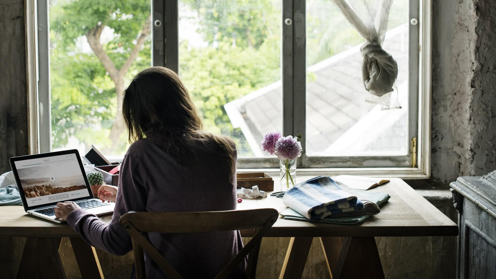 A woman working in her home office