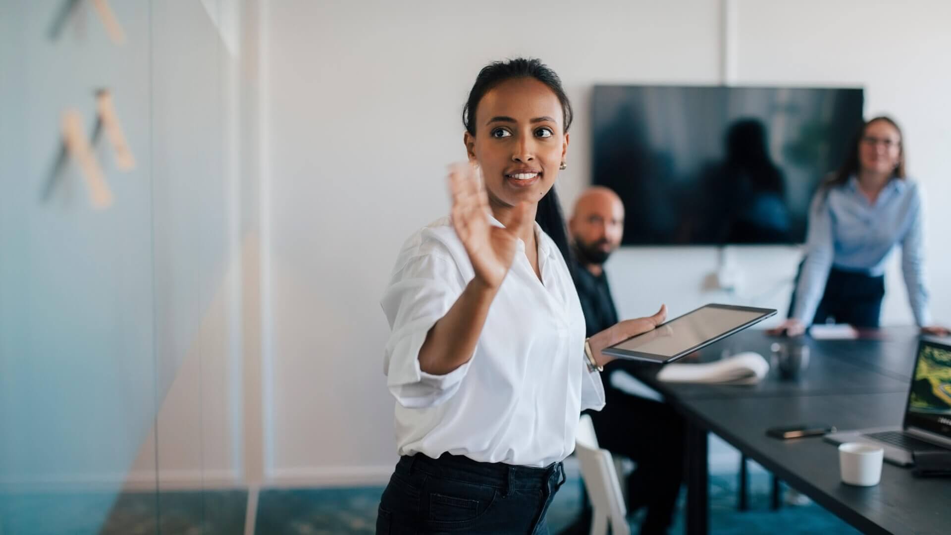 A woman giving a presentation at work