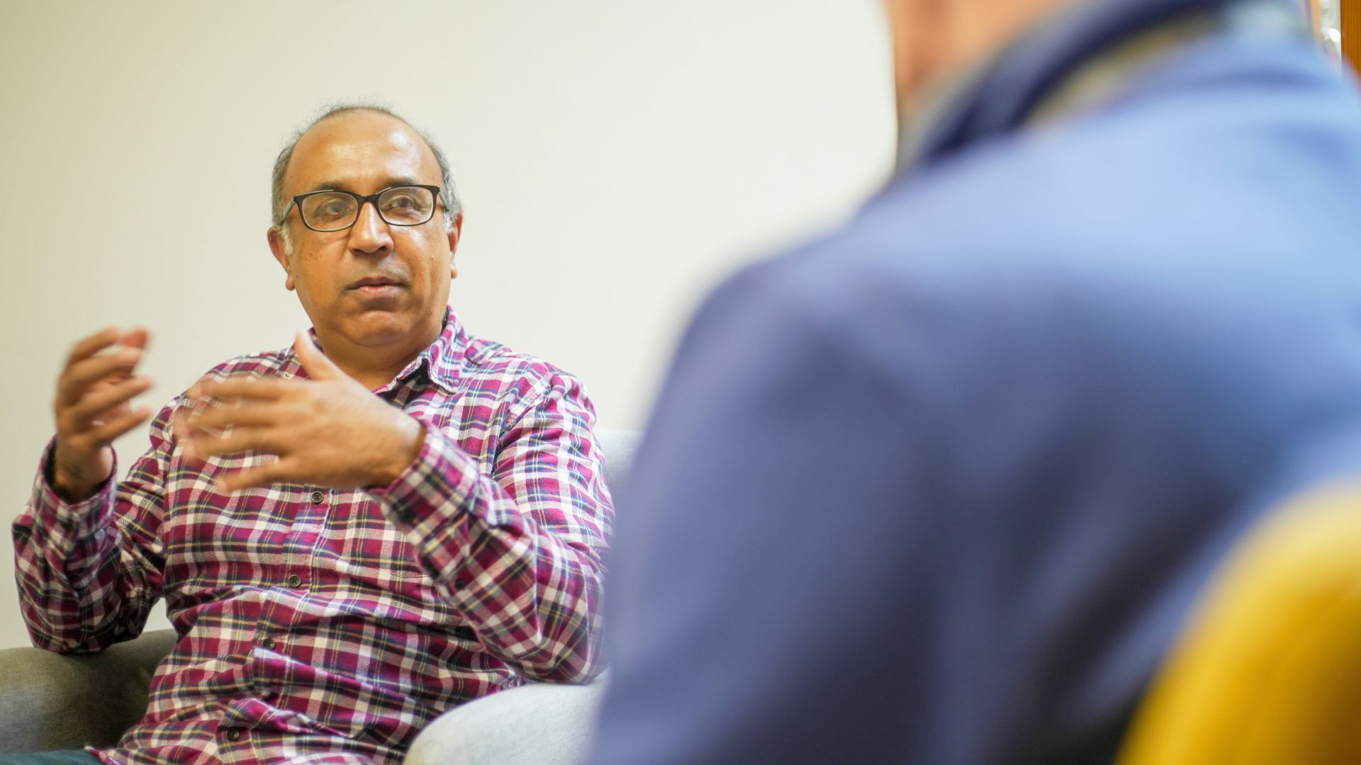 Babu in a counseling session with Stuart, an Ingeus Personal Wellbeing Advisor, discussing emotional wellbeing.