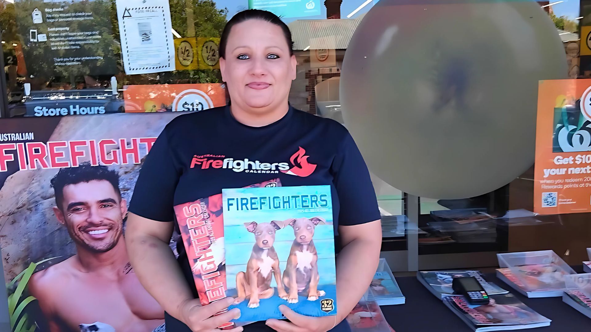 Gosha with charity calendars in her new role