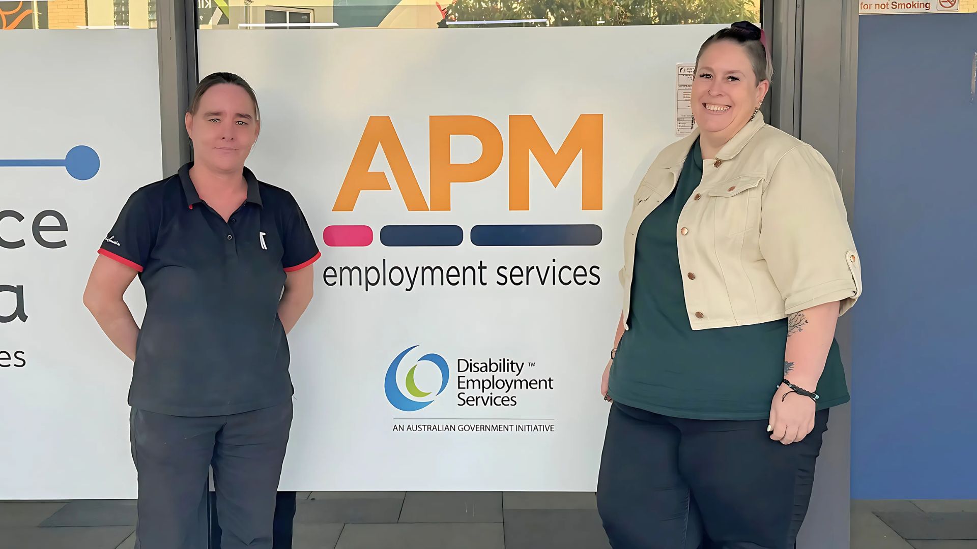 Christina and Bee outside an APM branch