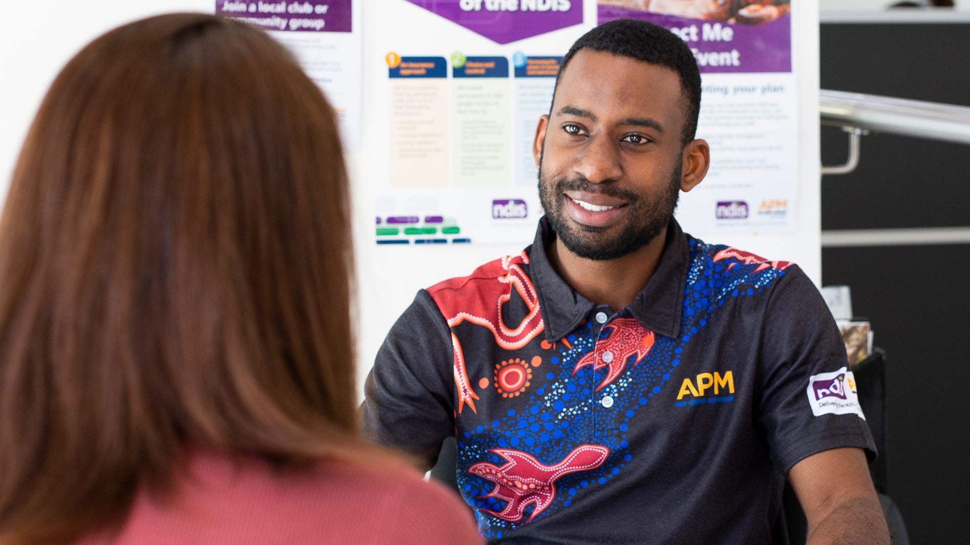 APM Communities team member in an APM top