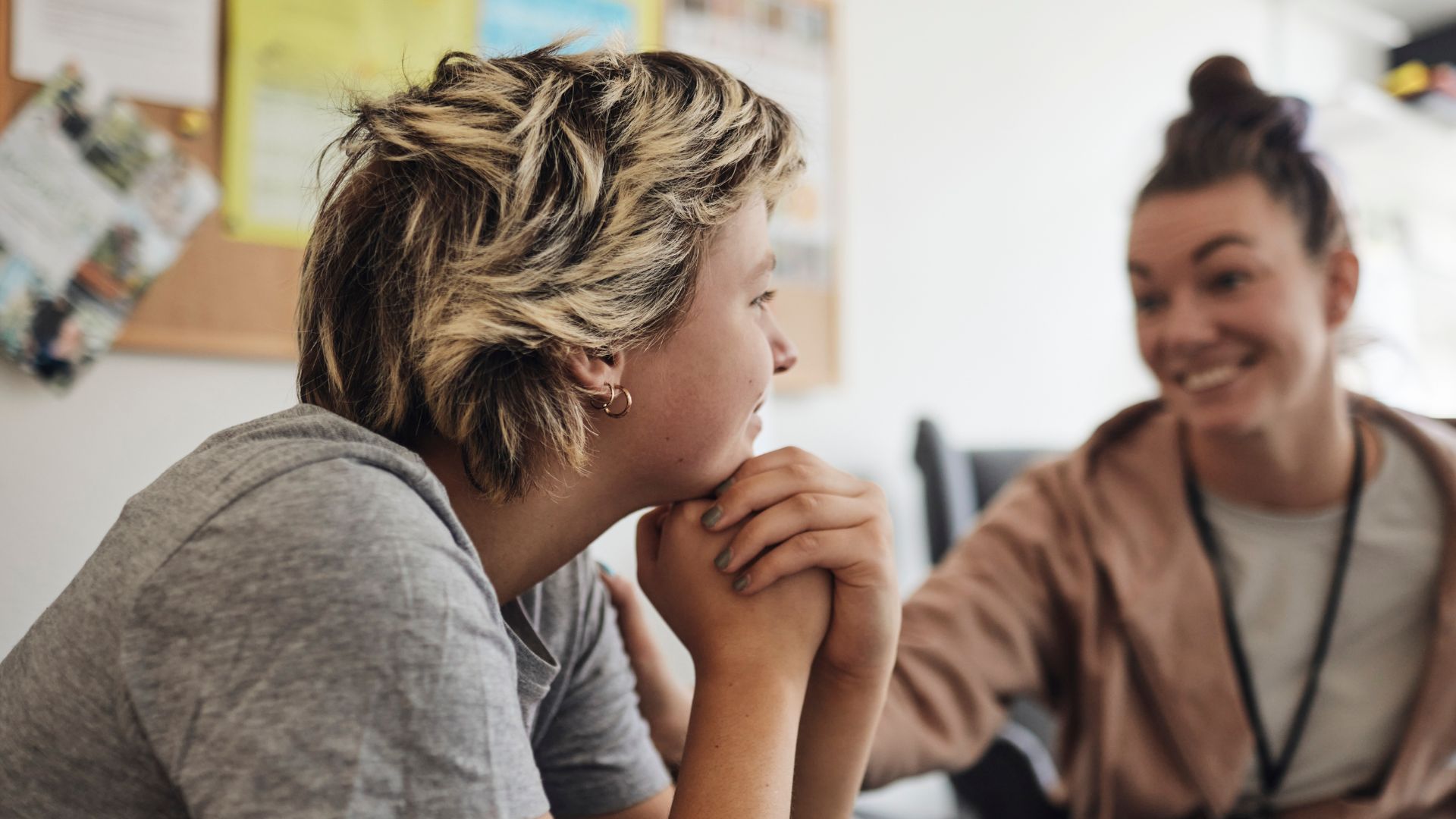 Two people speaking and listening